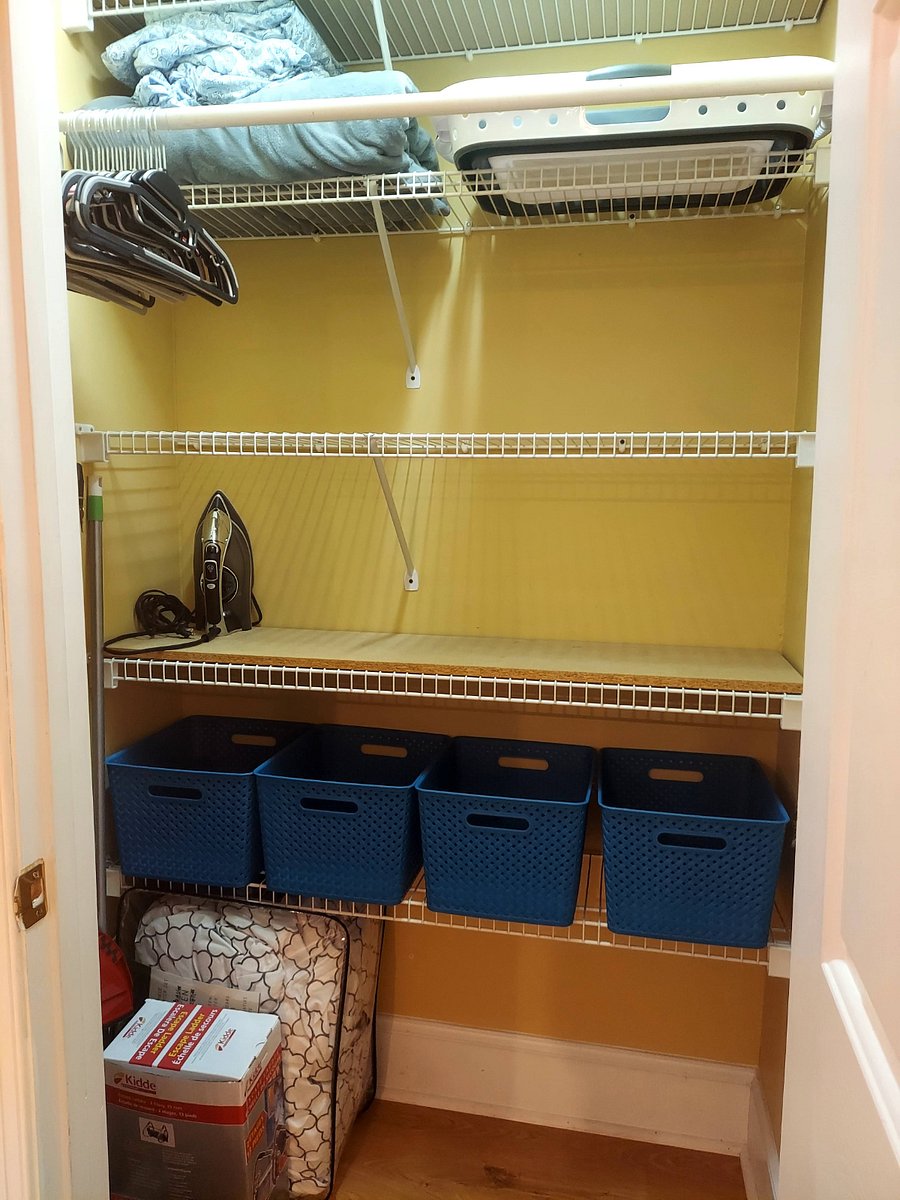 closet with shelves and baskets to stay organized