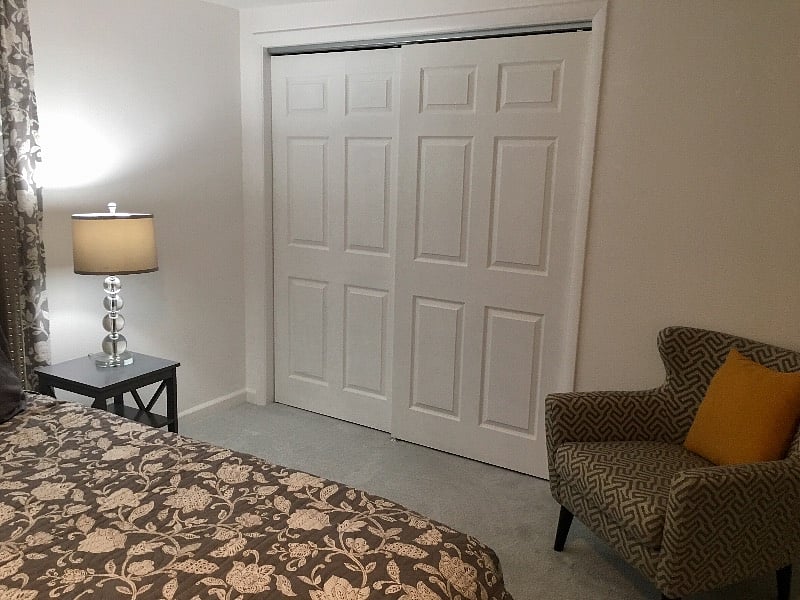 Just a close up of the closet. All of the doors in the apartment are 6 panel. The entry door to the apartment is solid wood. The closet has built-ins for storing linens and towels.