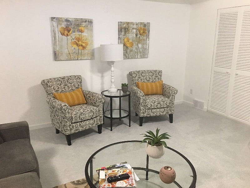 Two comfortable arm chairs, in addition to the matching sofa and love seat in the living room, give you lots of seating options.