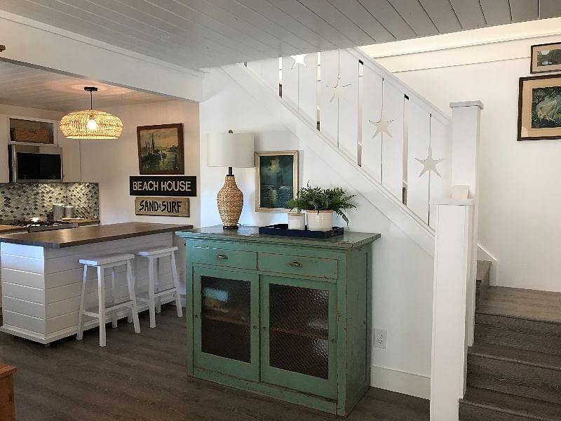 Stairway and kitchen.