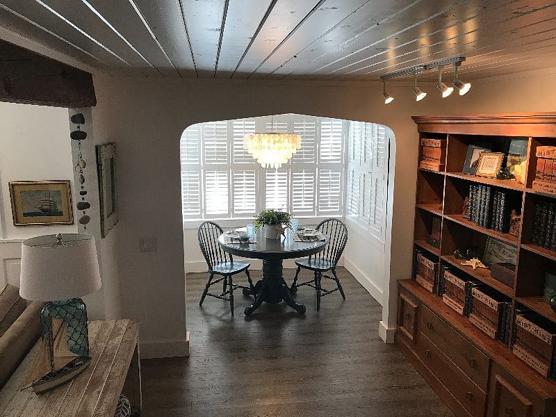 Dining nook in sunroom.