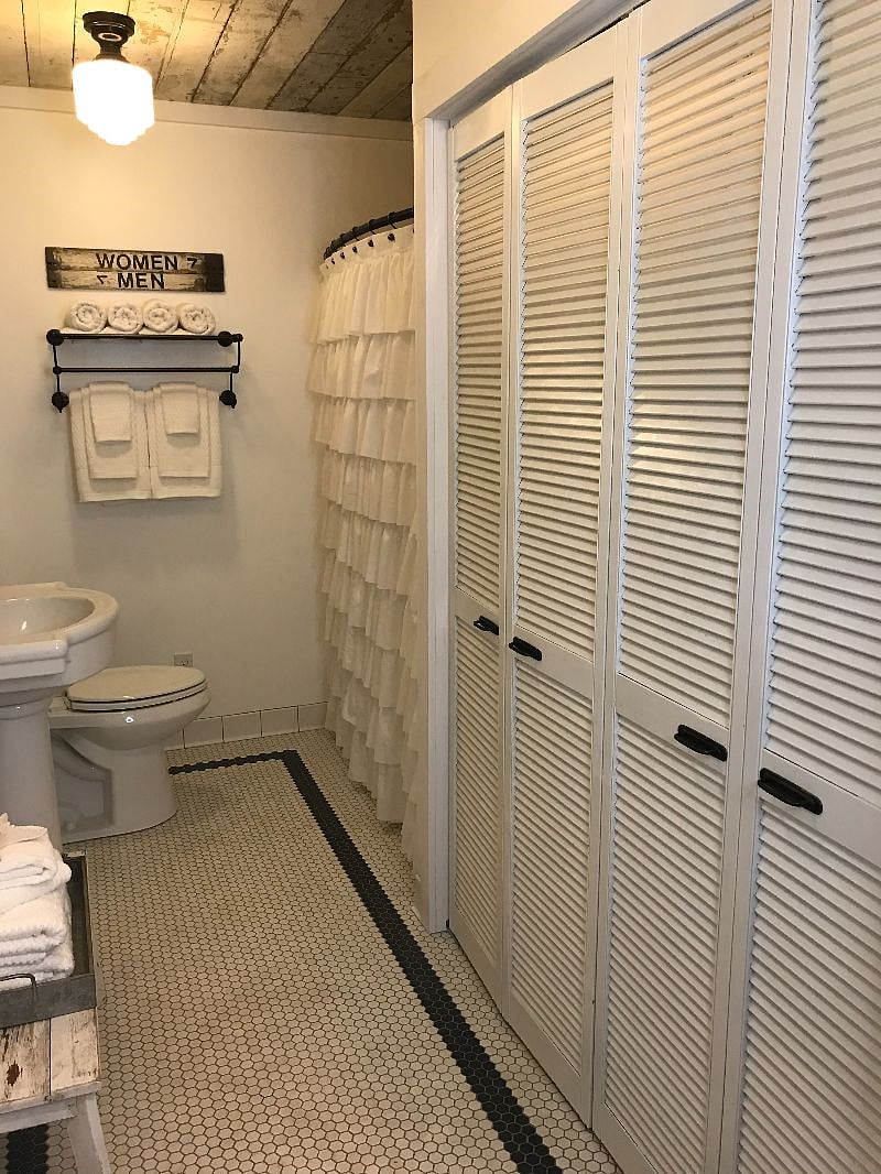 Main bathroom on first floor with shower.