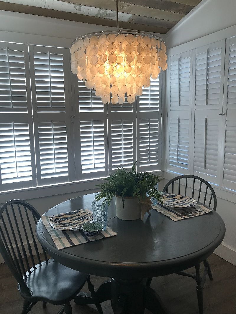 Dining nook in sunroom.