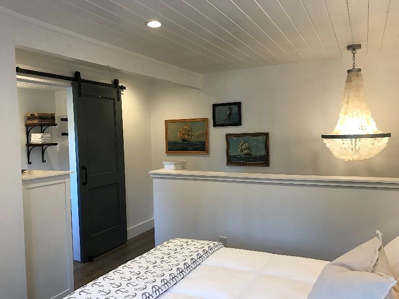View of upstairs bathroom from bed.