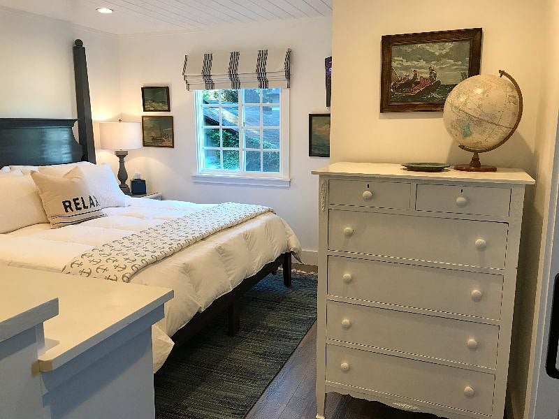 Upstairs bed, view of dresser.