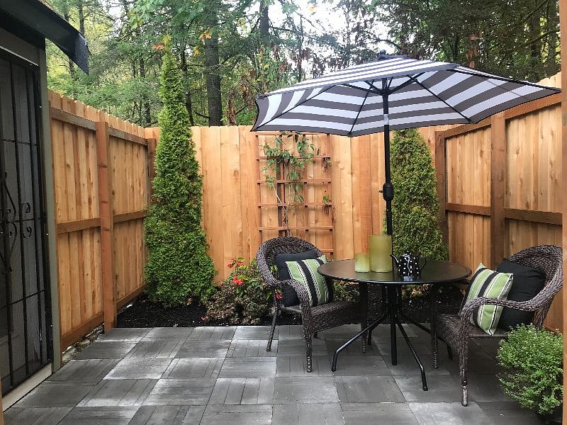 Door from back stairs to private outdoor patio area.