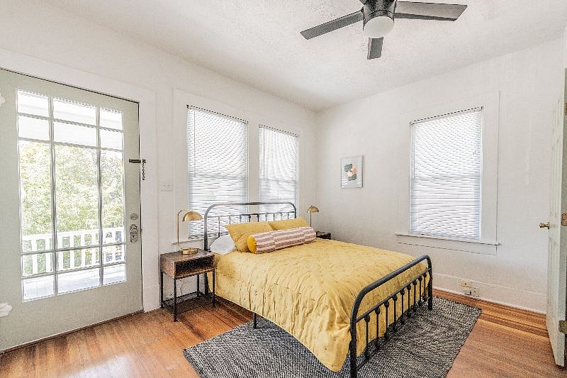 Queen bedroom with views of door to private patio
