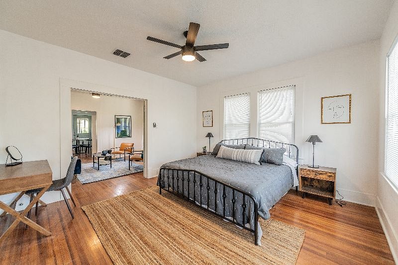 King bed with green tea infused memory foam mattress, desk and private entrance to front patio