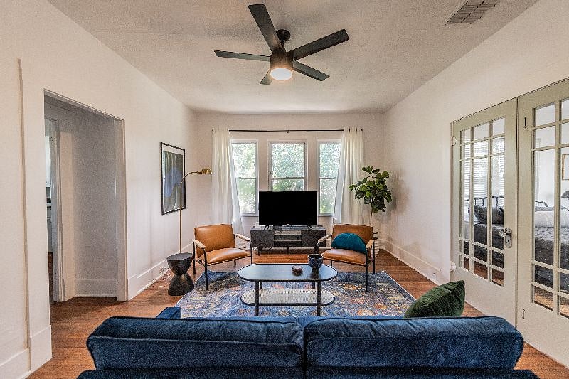 Living room with french doors to King bedroom