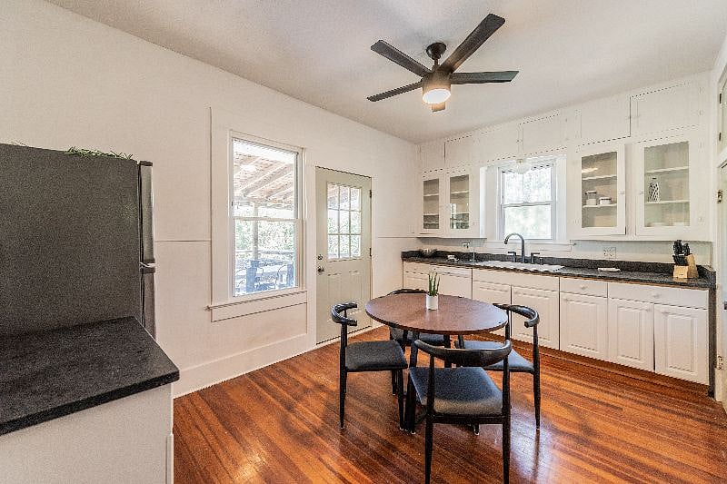 Kitchen with granite countertop, new faucet, original built in cabinets