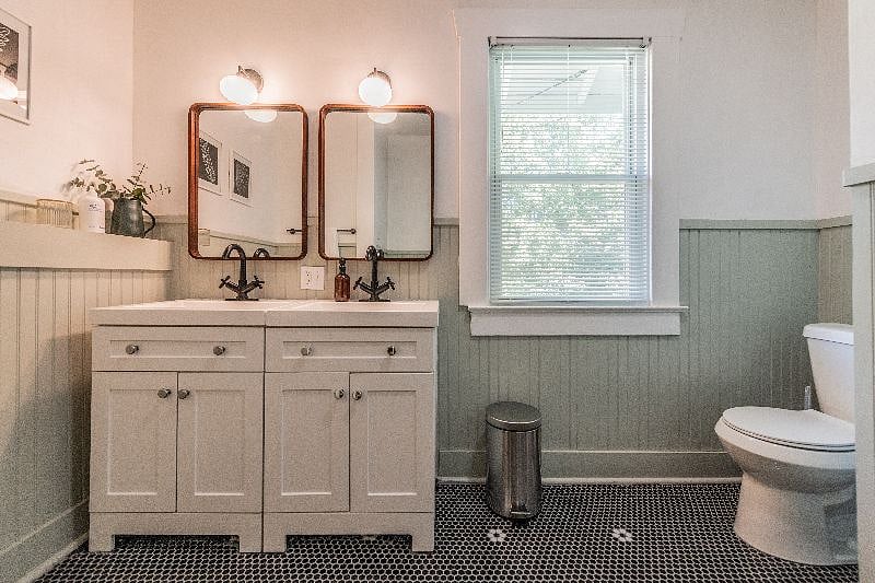 Views of Hallway bathroom double vanities