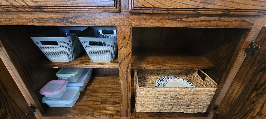 Extra Storage, food containers and paper plates.