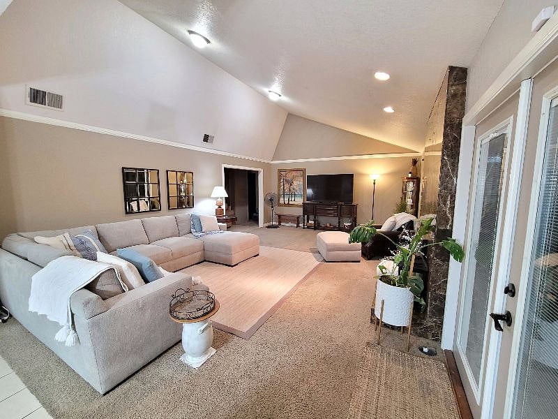 French doors lead out to the backyard living space.