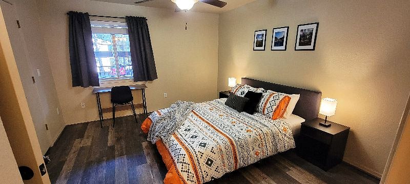 Your bedroom - features a queen bed, smart charging lamps, desk space, walk in closet. Your private bathroom is ensuite