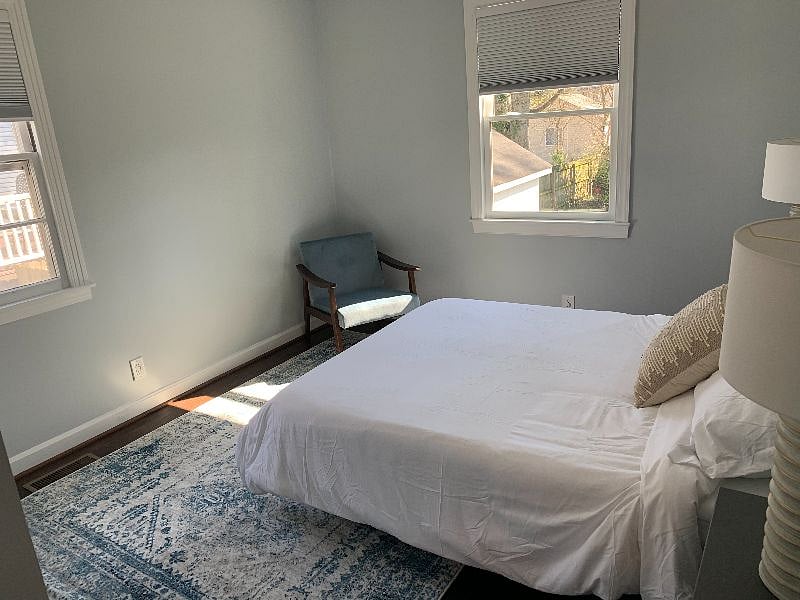 Bedroom 1: Bright and spacious bedroom with comfortable Queen-sized bed and light blocking shades for sleeping in! Spacious closet!