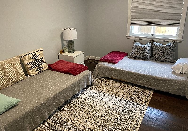 Bedroom #2 with 2 comfortable foam mattress twin beds. The beds can be moved side by side or stacked as a daybed. Spacious closet!