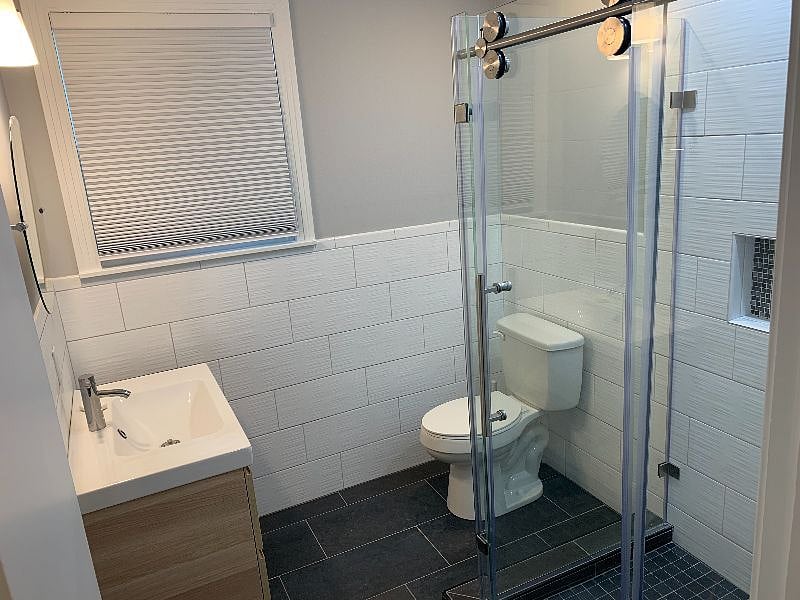 Hallway bathroom with shower