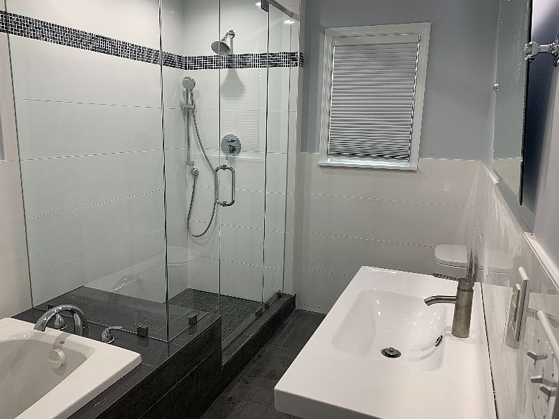 Front bathroom--Luxury Jacuzzi tub and shower for relaxation after a long day of work!