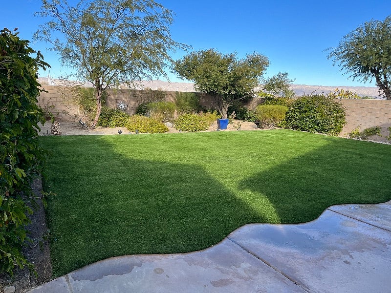 The totally private backyard is always green, all 12 months a year