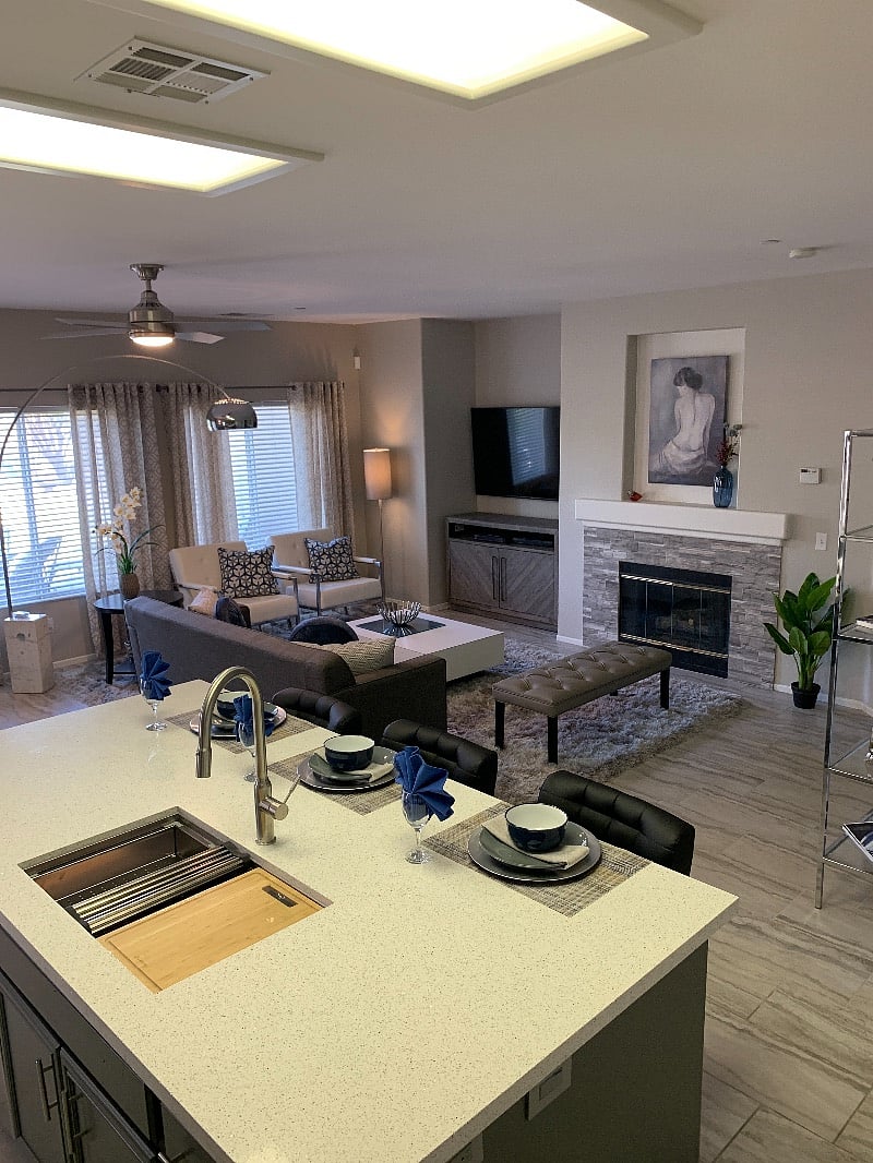 The brand new 65 TV sits near the romantic gas Fireplace.