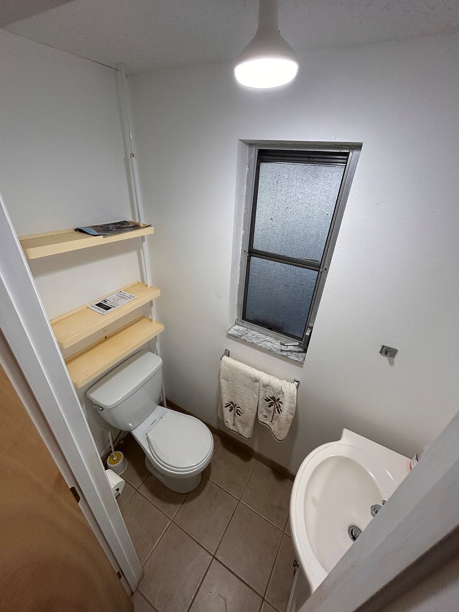 Half bath out in the garage space