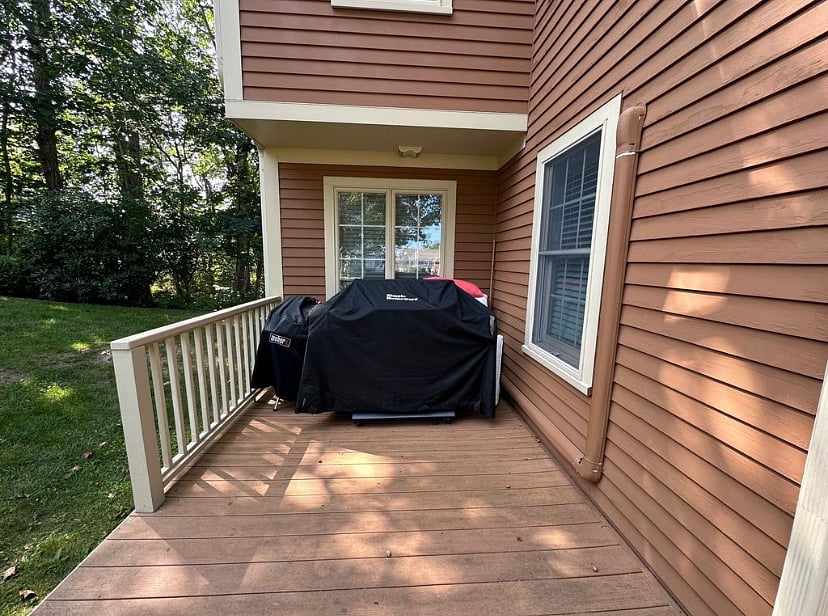 Gas grill and a Weber charcoal grill