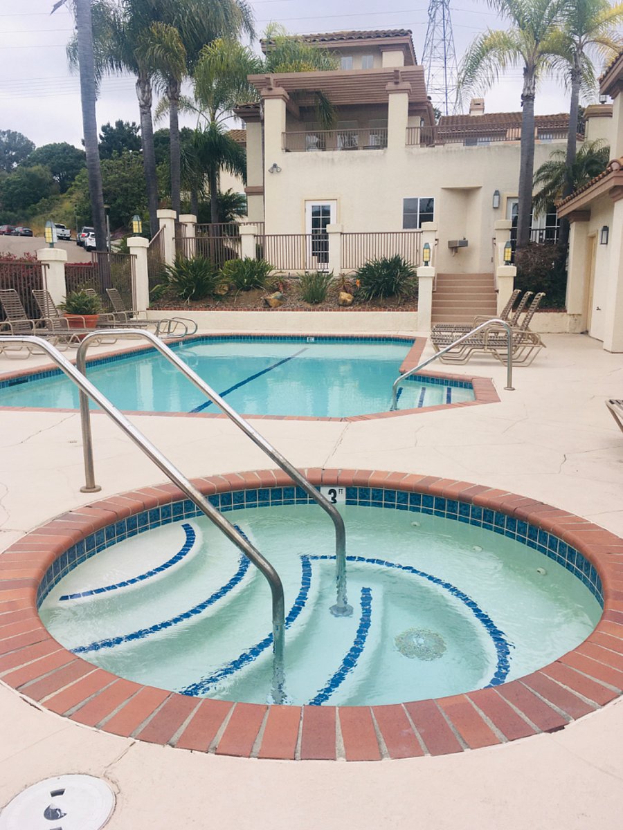 Jacuzzi, Pool, Steam Room and small workout room in Pool area.