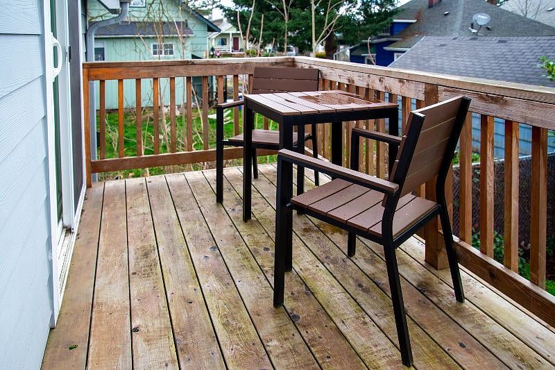 Outdoor deck and patio for al fresco dining or morning coffee.