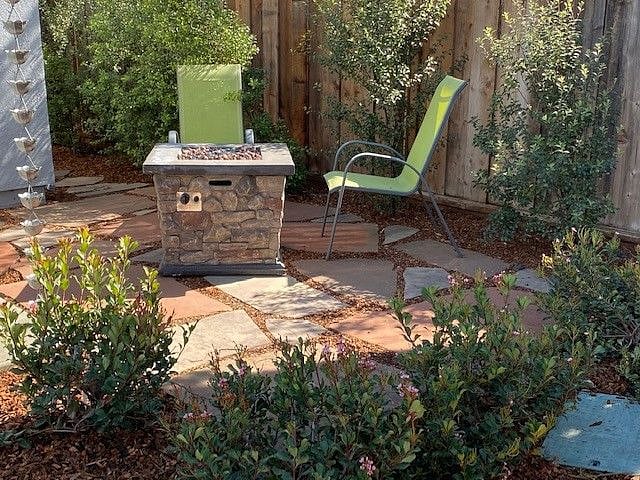 Outdoor propane firepit seating area.