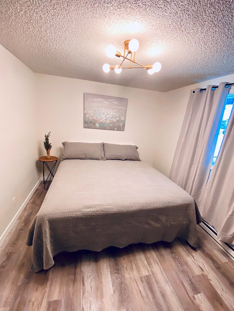 King bed. Large closet with hangers and drawers.