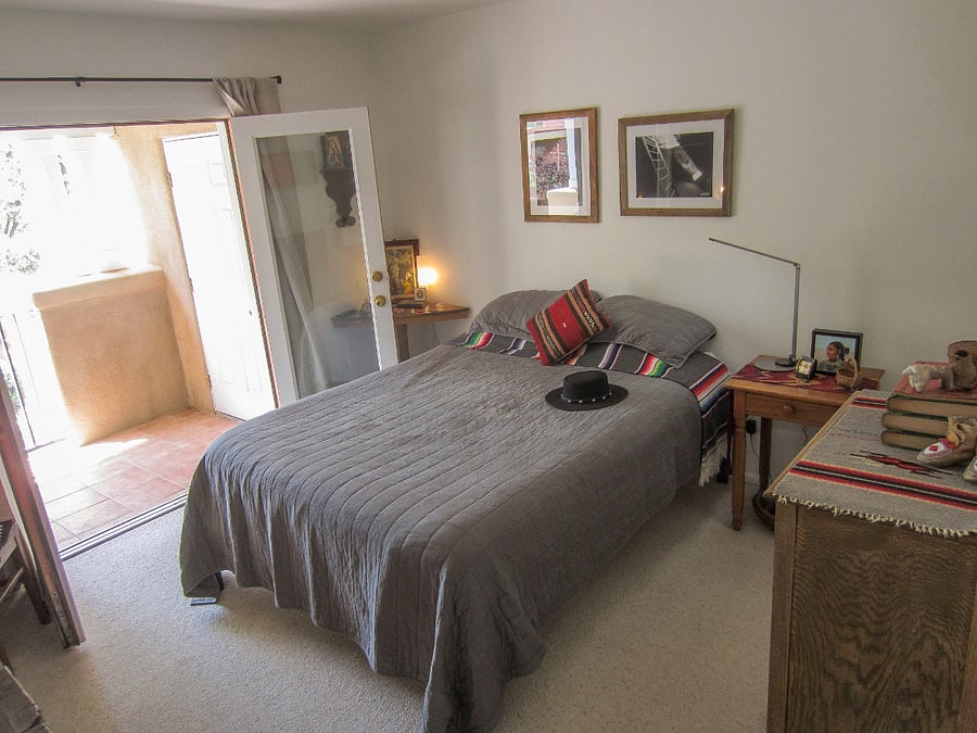 Bedroom With Queen Bed and Double Patio Doors