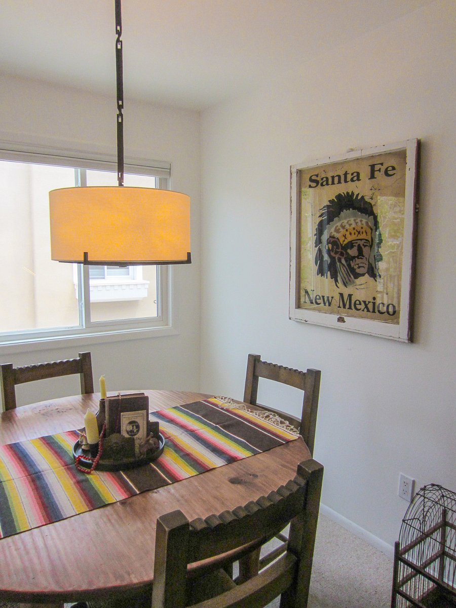 Airy Dining Room With Oak Dining Table
