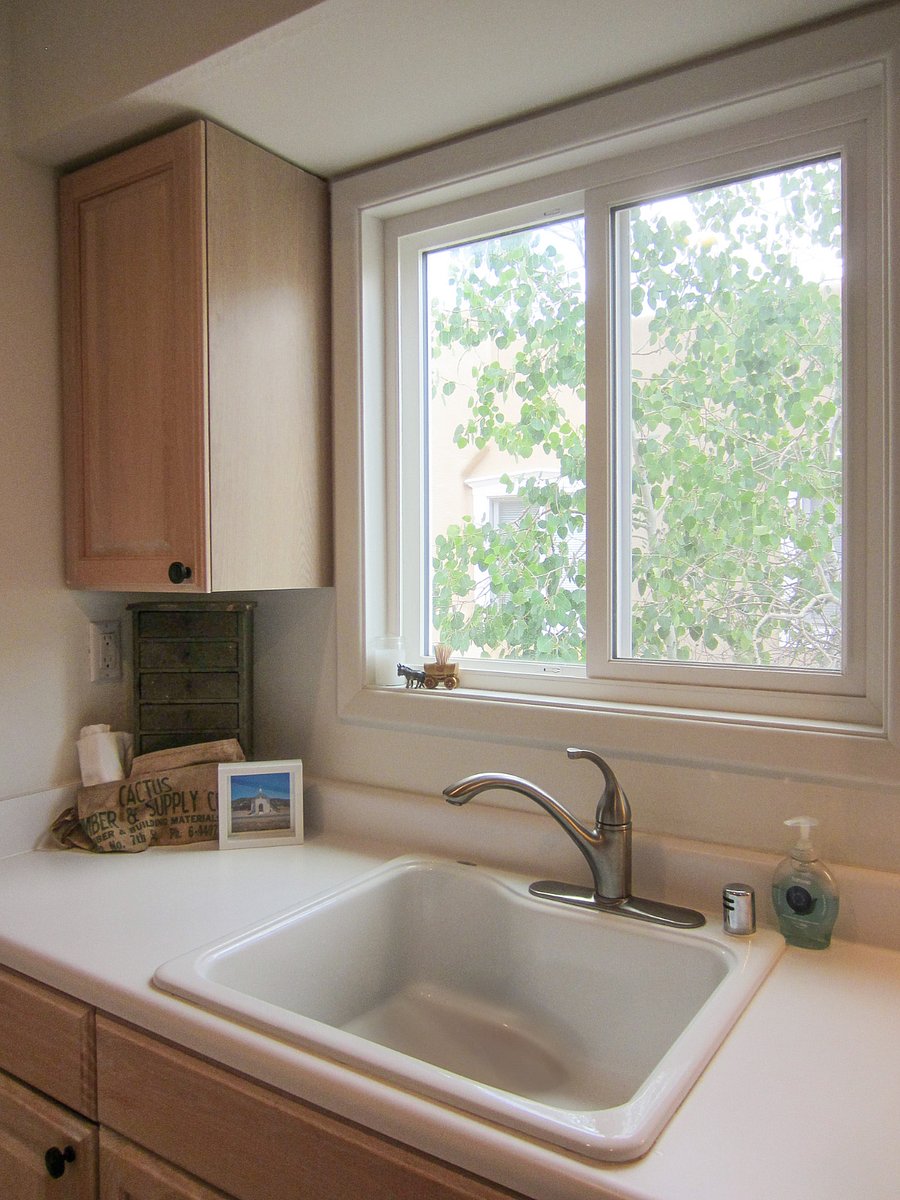 Bright Galley Kitchen With Large Sink