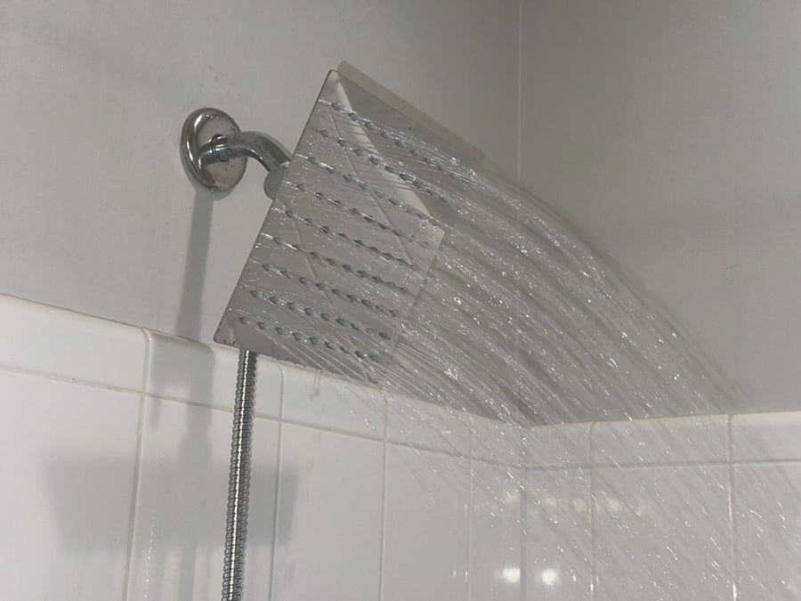 Rainfall shower with detachable head.