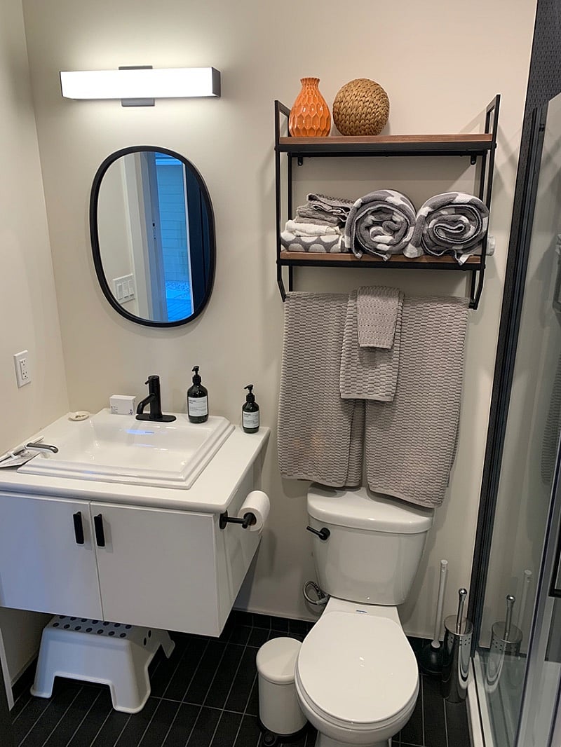 Fully equipped bathroom with large walk in shower.