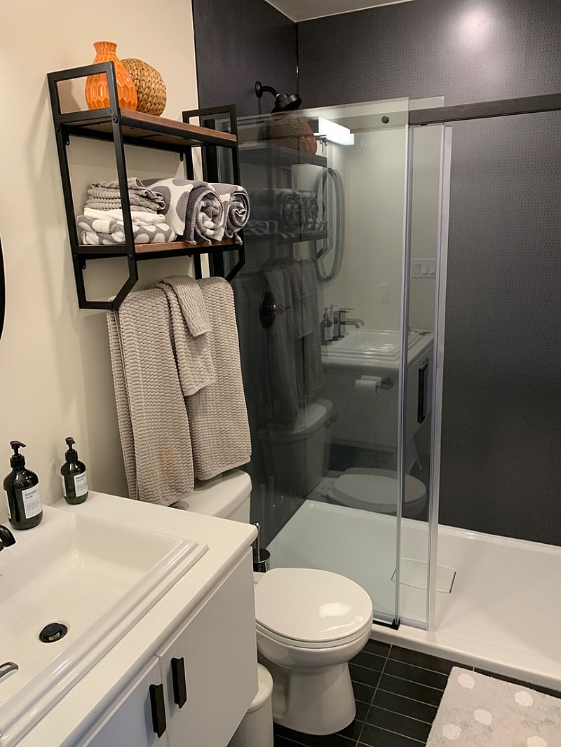 Fully equipped bathroom with large walk in shower.