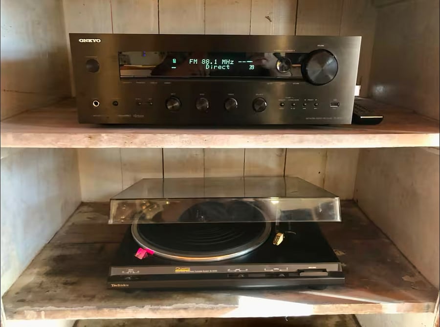 Stereo receiver and Technics turntable, so you can play from the radio, from your phone, or from your vinyl collection!
