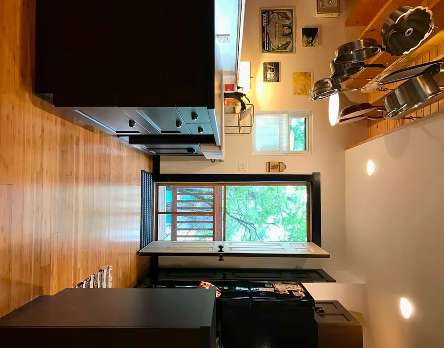 Open floor-plan kitchen with new, sparkling clean appliances
