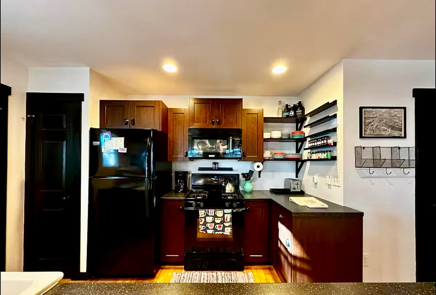 Kitchen is equipped with full-size fridge, gas stove, microwave, coffee maker, toaster, blender, dishes, glasses, mugs, silverware, pots, pans... everything you could need to plan a meal!