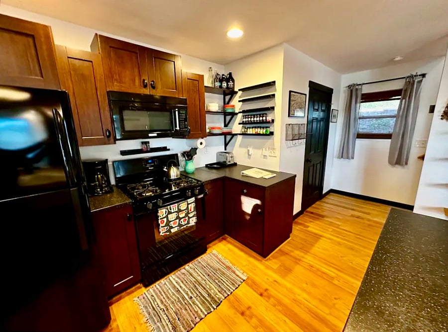 Kitchen is equipped with full-size fridge, gas stove, microwave, coffee maker, toaster, blender, dishes, glasses, mugs, silverware, pots, pans... everything you could need to plan a meal!