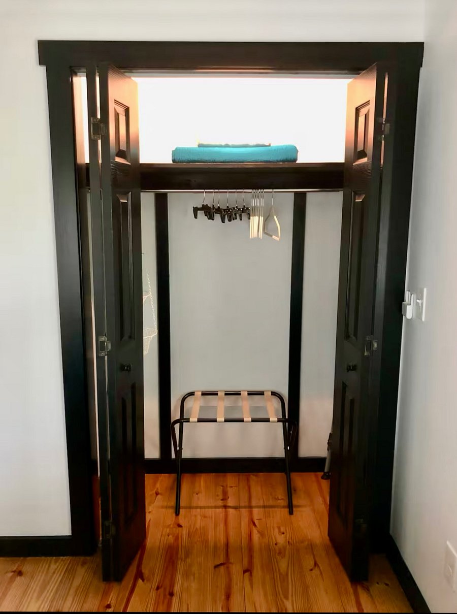 Each bedroom has a spacious closet with hangers, shelves, extra blankets, and a luggage rack