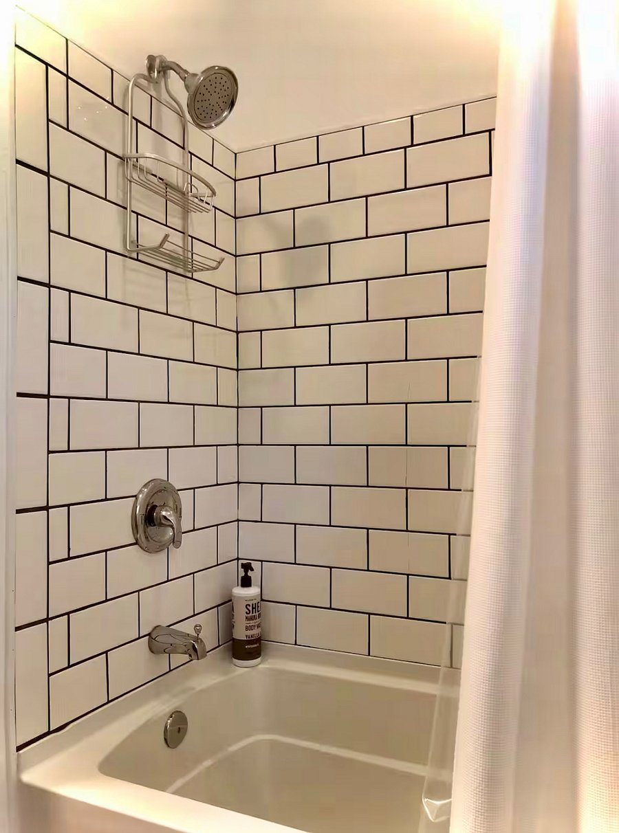 Full bath upstairs with shower and tub, great for a relaxing soak at the end of the day