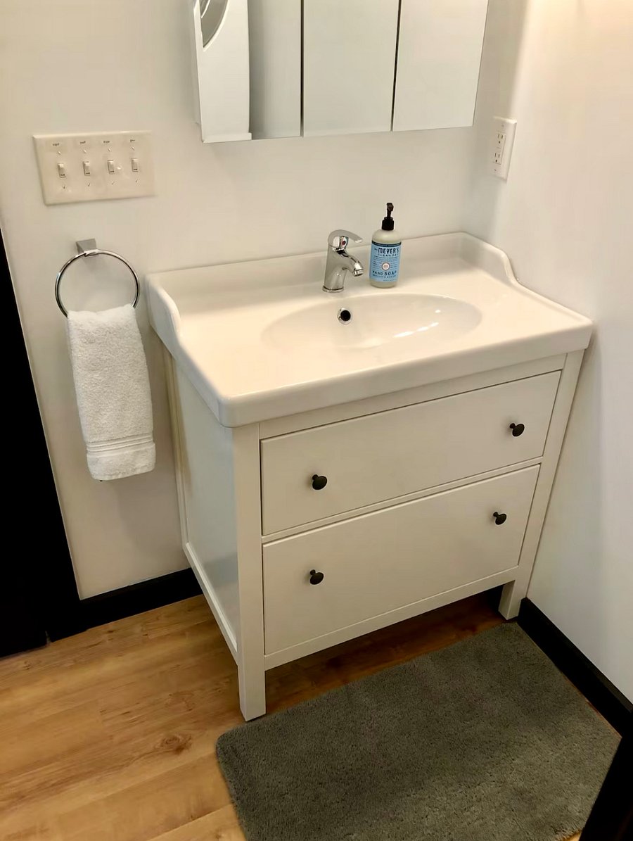 Large vanity with drawers in full bath