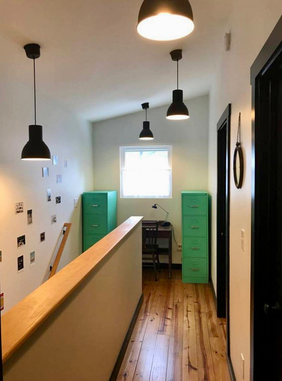 Upstairs hall with a second desk and filing cabinets