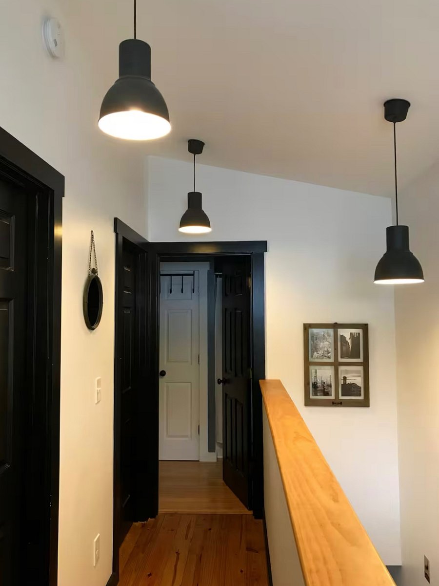Upstairs hall with mirror and lots of light