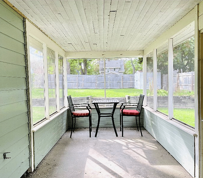 Screened in patio in backyard