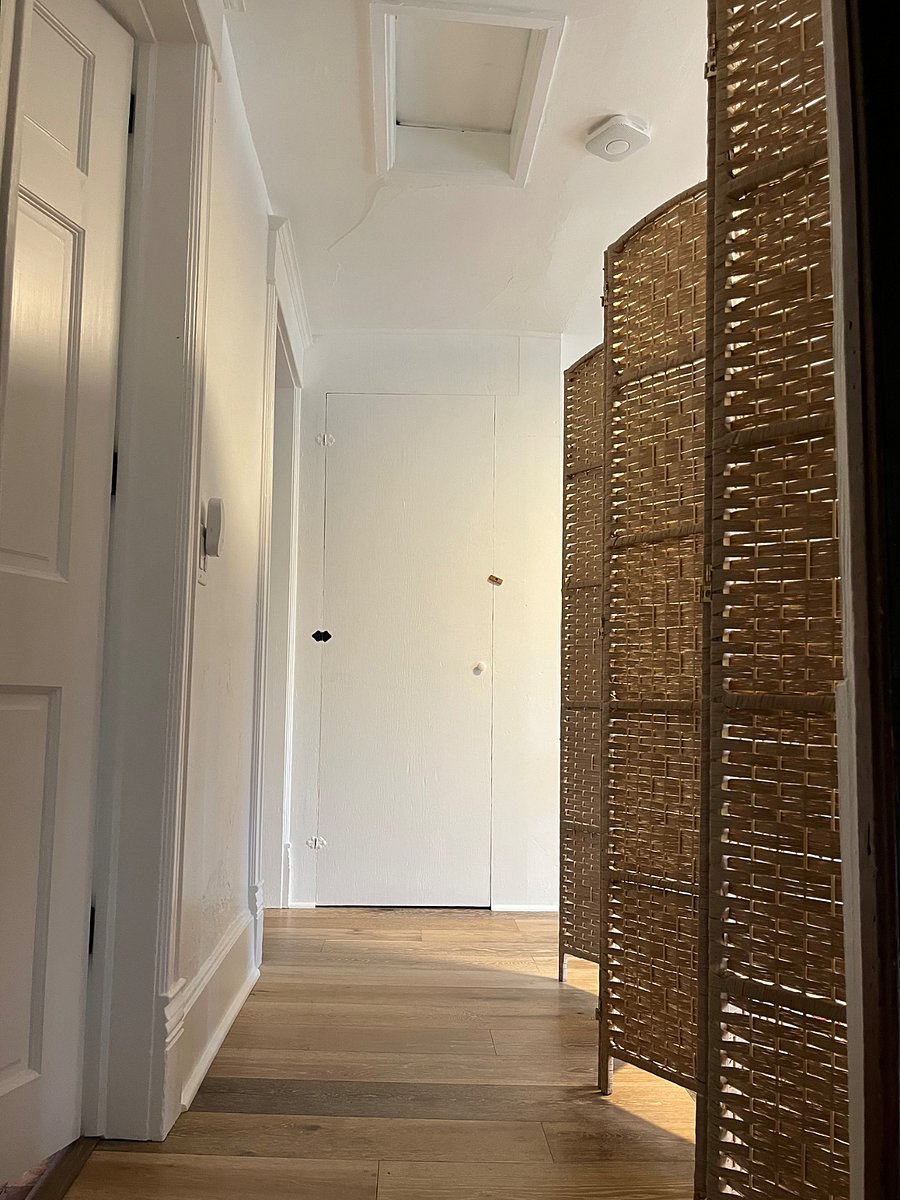 Entrance to the second floor from the top of the stairs. My office is the first door to the left, your private space is the next doorway on the left to your bedroom and bathroom and to the right to your living room.
