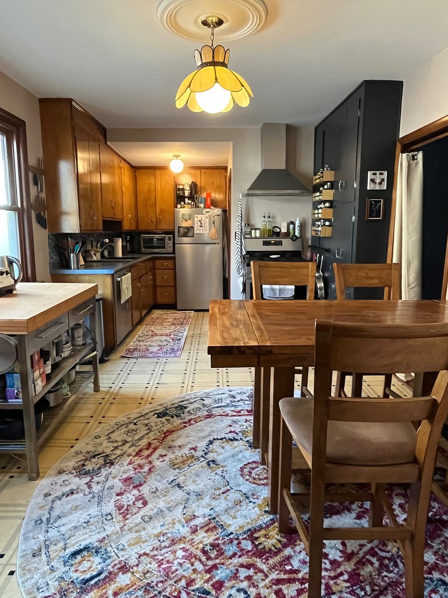 View of the shared kitchen, which you have full access to. The back/main entrance is to the right of the fridge.