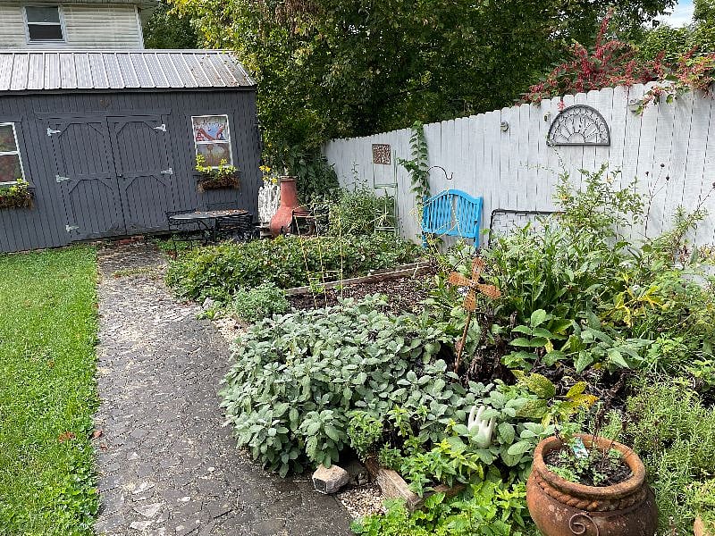 Private, secure backyard with Chimenea and raised garden beds. Bicycle/chairs/games in shed available for your use.