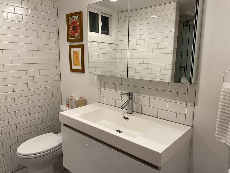 The marble bathroom is spacious and luxurious.